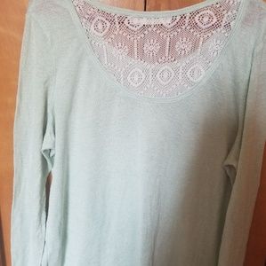 It's a real blue color longsleeve shirt with lance